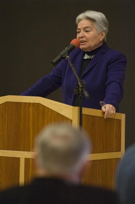 Dr. Linda Sue Warner, president of Haskell Indian Nations University in Lawrence, Kansas, and a member of the Comanche Nation of Oklahoma, speaks to a crowd Friday evening at the Neal-Marshall Black Culture Center. The topic of the symposium was on Native Americans in higher education. 