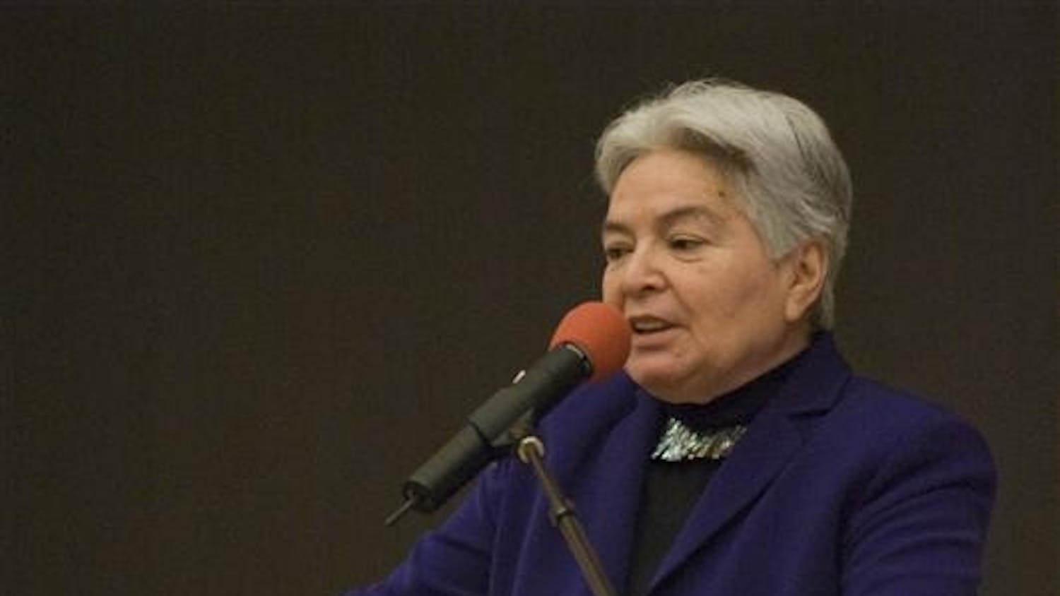 Dr. Linda Sue Warner, president of Haskell Indian Nations University in Lawrence, Kansas, and a member of the Comanche Nation of Oklahoma, speaks to a crowd Friday evening at the Neal-Marshall Black Culture Center. The topic of the symposium was on Native Americans in higher education.