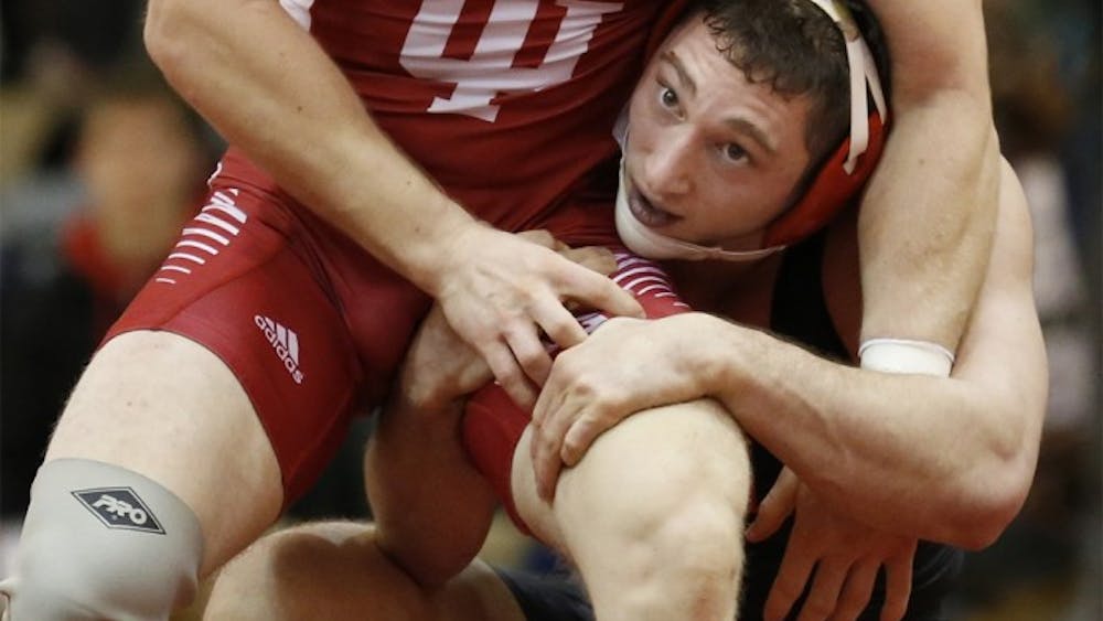 Jake Danishek wrestles in a 157 lbs match with Lou Mascola from Maryland on January 5, 2016 at University Gym. IU lost against Northwestern, 12-27, on Sunday, Jan. 11, at the University Gym.&nbsp;