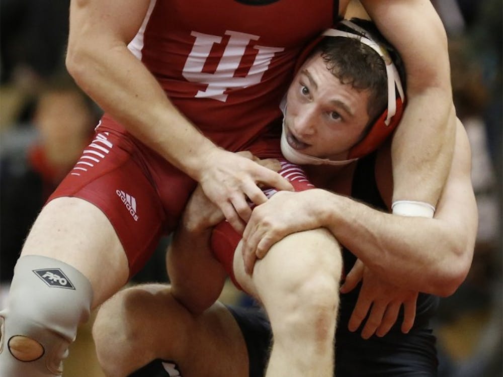 Jake Danishek wrestles in a 157 lbs match with Lou Mascola from Maryland on January 5, 2016 at University Gym. IU lost against Northwestern, 12-27, on Sunday, Jan. 11, at the University Gym.&nbsp;