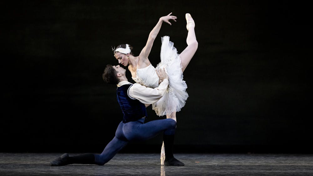 Dancers perform as Odette and Prince Siegfried in &quot;Swan Lake&quot; Act Two on March 30, 2022. The excerpt was performed as part of the IU Jacobs School of Music Ballet Theater&#x27;s spring ballet &quot;A Look Back.&quot;