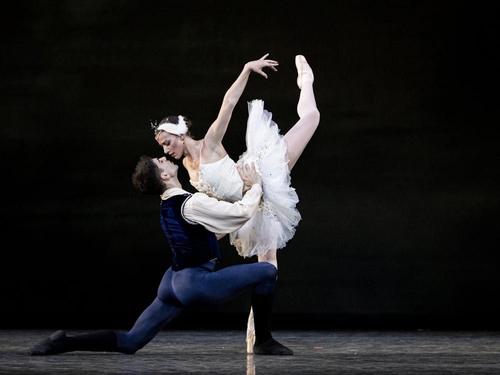 Dancers perform as Odette and Prince Siegfried in &quot;Swan Lake&quot; Act Two on March 30, 2022. The excerpt was performed as part of the IU Jacobs School of Music Ballet Theater&#x27;s spring ballet &quot;A Look Back.&quot;