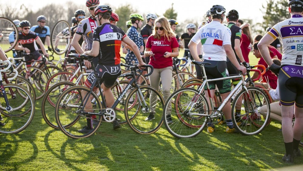 IU Student Foundation members place chips on bikes in order to track and time riders during a practice session for Little 500 in 2018. The number of teams in the 2019 Little 500 this year is the lowest it has been in more than 50 years.