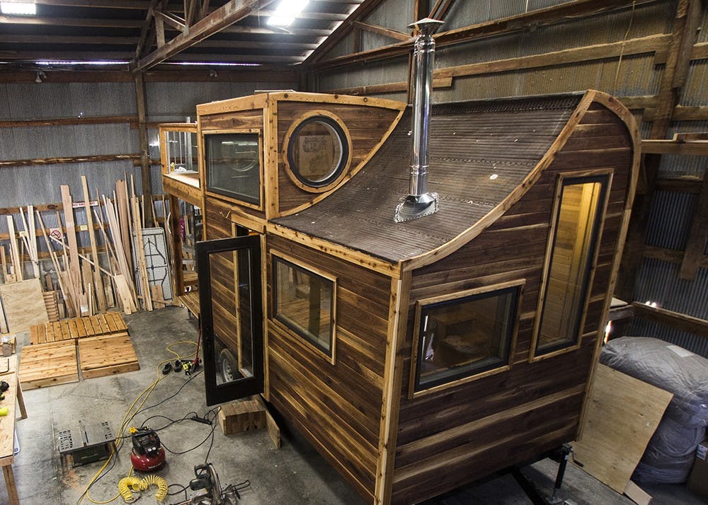 Daniel Weddle's tiny house sits in a construction warehouse off 11th Street. The project was commissioned to be placed on a southern Indiana farm, and can be both mobile and permanently set.