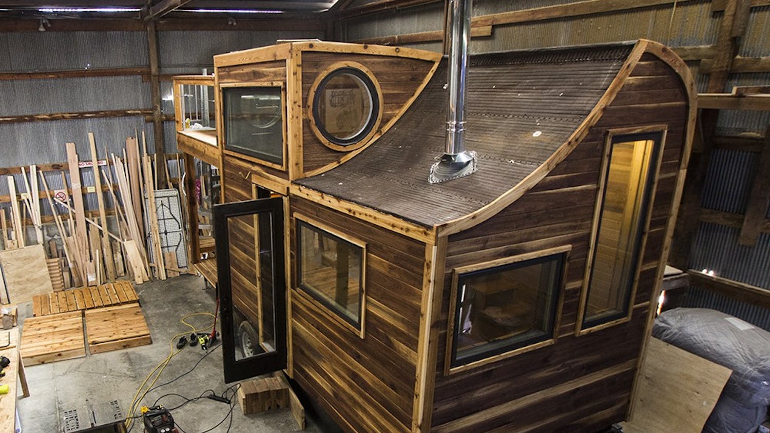 Daniel Weddle's tiny house sits in a construction warehouse off 11th Street. The project was commissioned to be placed on a southern Indiana farm, and can be both mobile and permanently set.