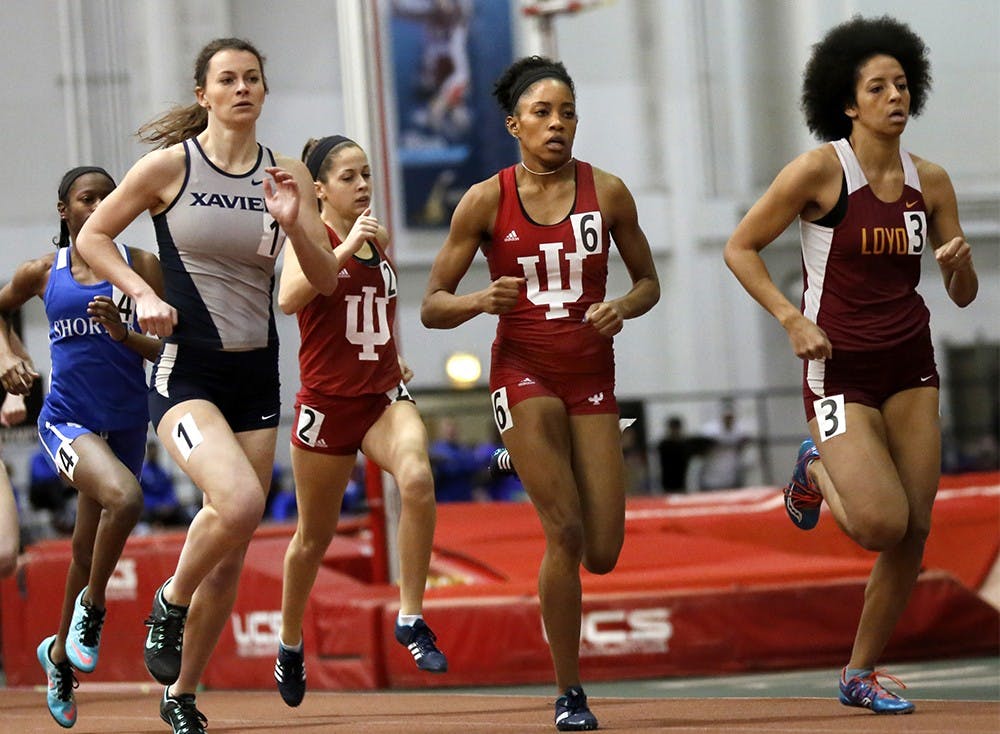 Taylor Williams, center number 6, competes in Women 600 Meter Run on Jan. 23 at Gladstein Fieldhouse. She finished the race as a first place. 
