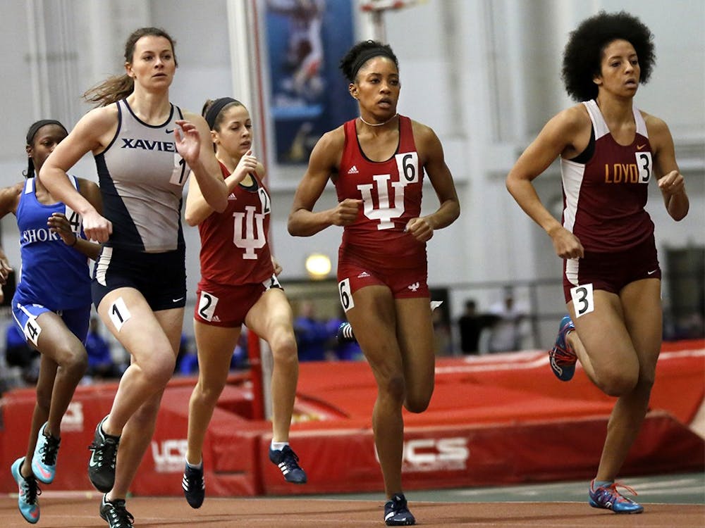 Taylor Williams, center number 6, competes in Women 600 Meter Run on Jan. 23 at Gladstein Fieldhouse. She finished the race as a first place. 