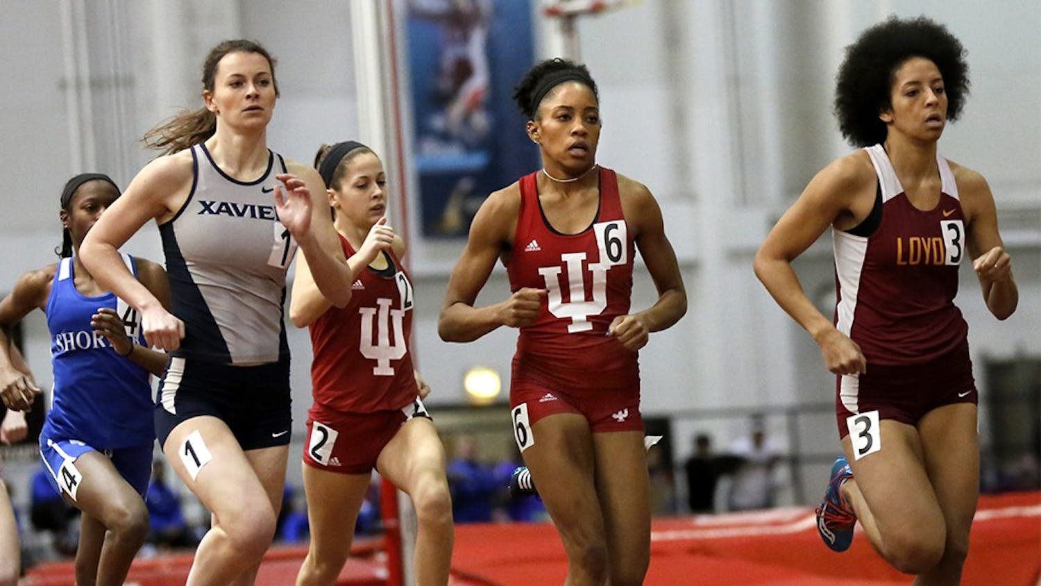 Taylor Williams, center number 6, competes in Women 600 Meter Run on Jan. 23 at Gladstein Fieldhouse. She finished the race as a first place. 