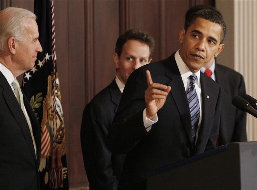 President Barack Obama speaks about his fiscal 2010 federal budget, Thursday, Feb. 26, 2009, in the Eisenhower Executive Office Building on the White House campus in Washington, Thursday, Feb. 26, 2009. Vice President Joe Biden is at left, and Treasury Secretary Tim Geithner is at center. 