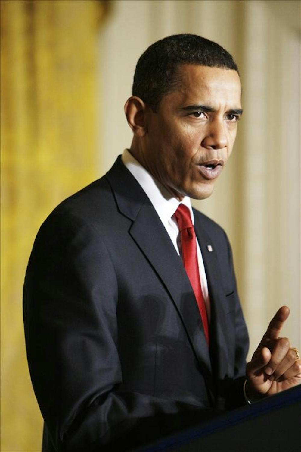 President Barack Obama speaks about the economy and the establishment of the Economic Recovery Advisory Board, chaired by Paul Volcker, not pictured, Friday in the East Room of the White House in Washington.