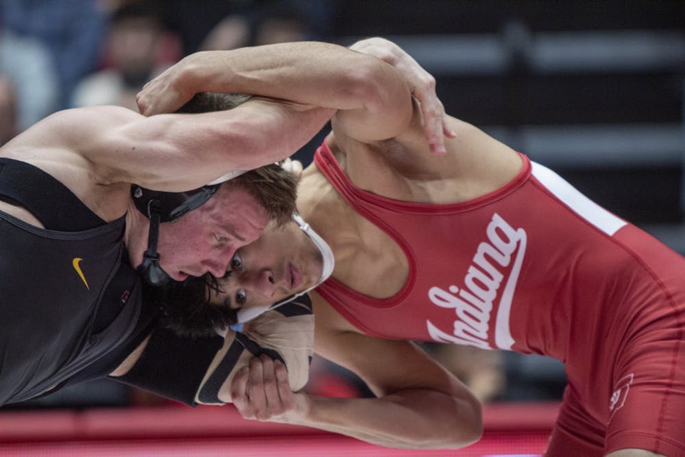 Then-freshman Eddie Bolivar wrestles Iowa then-sophomore Max Murin Jan. 10, 2020, in Wilkinson Hall. Eight Indiana wrestlers finished in the top five at the Mountaineer Invitational on Sunday in Boone, North Carolina. 
