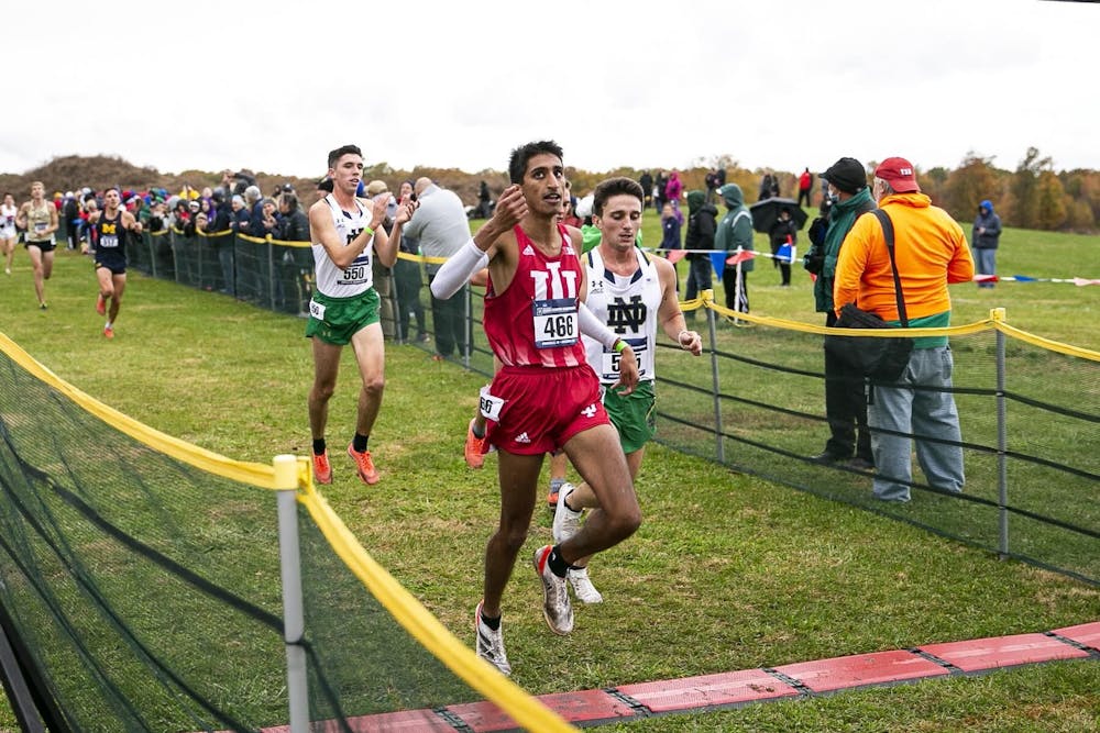 <p>Then-senior Arjun Jha runs during NCAA Great Lakes Regional on Nov. 12, 2021, in Evansville, Indiana. IU will host the Coaching Tree Invitational to honor the legacy of head coach Ron Helmer on Sept. 16.</p>