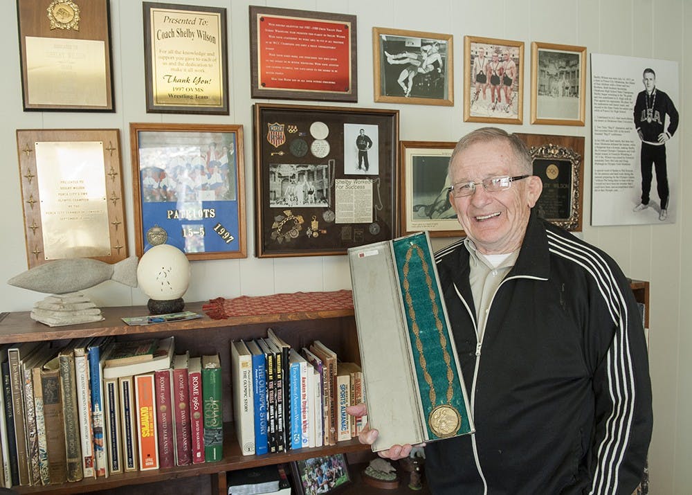 Shelby Wilson with the gold medal that he won at the 1960 Rome Summer Olympics. 