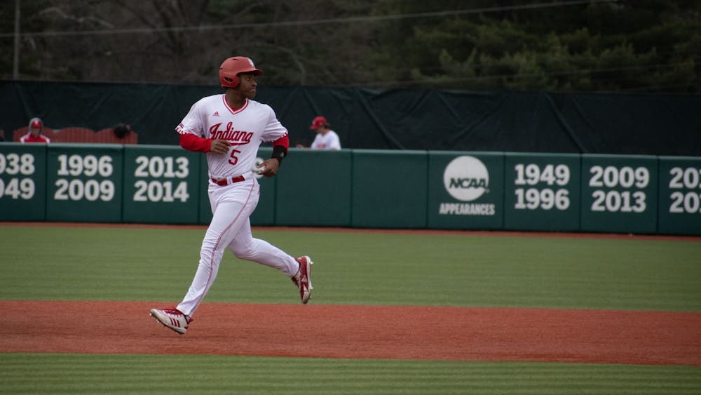 Freshman outfielder Devin Taylor looks back while running the bases March 21, 2023, at Bart Kaufman Field in Bloomington. Two Indiana baseball players took home weekly Big Ten honors on Monday.