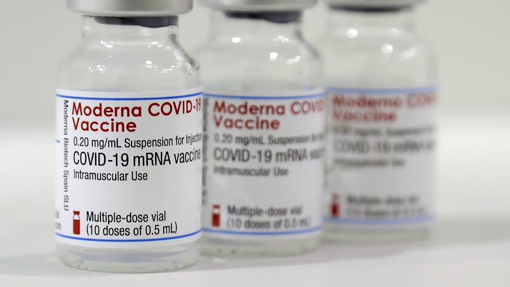 Three vials of the Moderna COVID-19 vaccine are pictured in 2021. The Monroe County Public Health Clinic announced in a press release they will partner with local school systems to hold “Super Shot” clinics to administer the Pfizer COVID-19 vaccine shot to children 5 tohrough 11 years old.