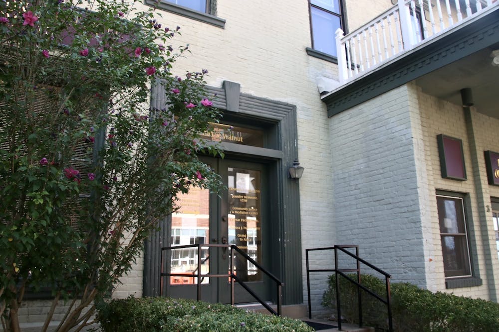 <p>205 S. Walnut St. is pictured Aug. 20, 2021. The Community Justice and Meditation Center, one of the organizations that will be in attendance at the Tenant Resource Fair, is located, is located on the upper level. </p>