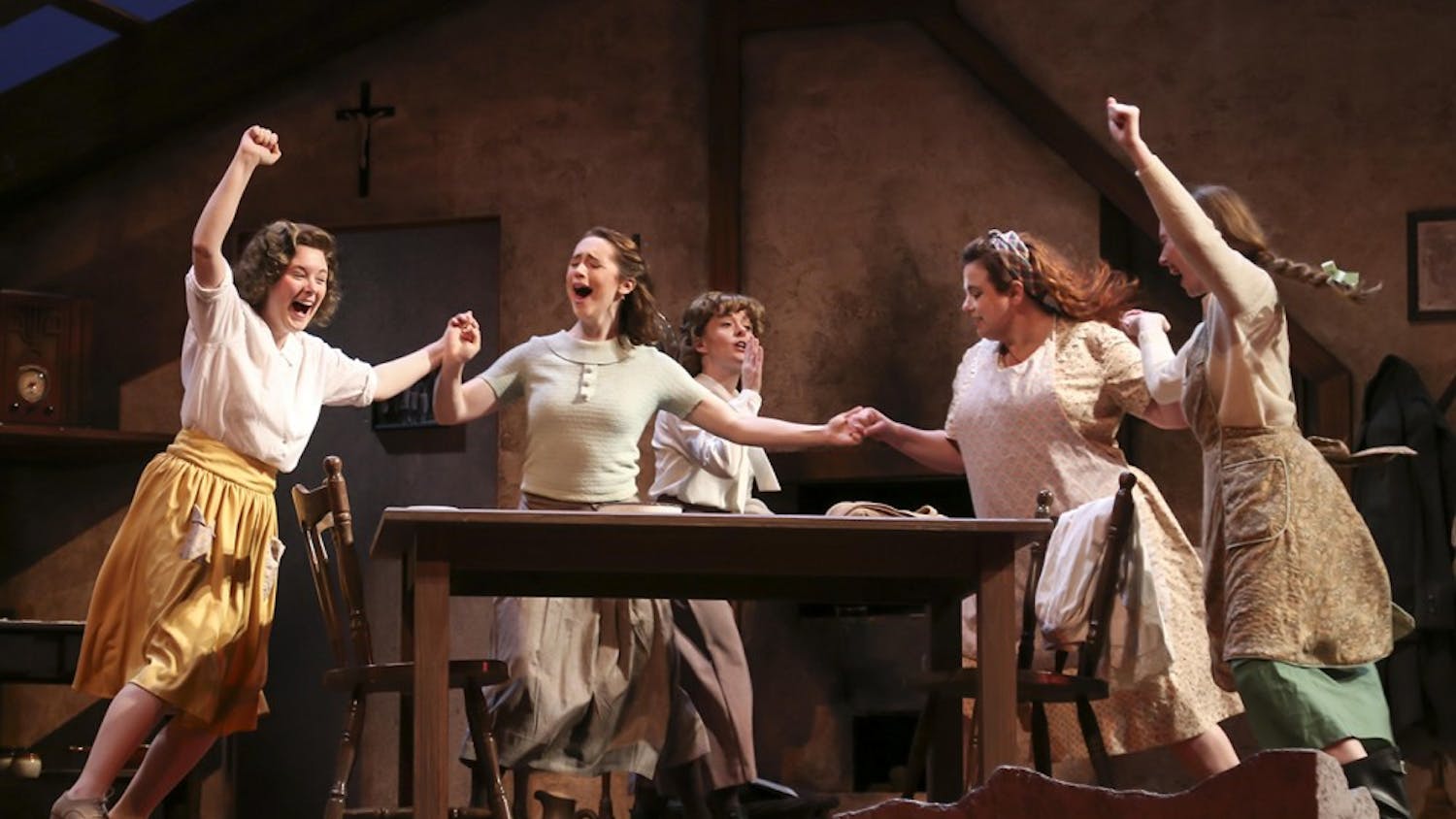 Performers dance during a scene of "Dancing at&nbsp;Lughnasa." The show opens Friday in the&nbsp;Ruth N. Halls Theatre.