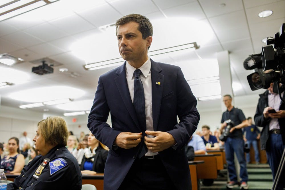 South Bend Mayor and 2020 presidential candidate Pete Buttigieg attends a board of public safety swearing-in ceremony at the South Bend Police Department Wednesday June 19, 2019, in South Bend, Indiana. Buttigieg is navigating fallout after a white police officer shot a black suspect.