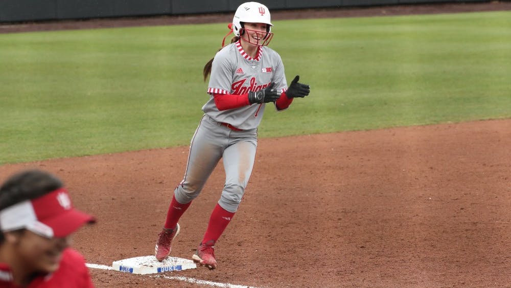 Sophomore Camryn Woodall celebrates Feb. 17 during the game against Syracuse University. Woodall started at second base and was No. 2 in the batting order.