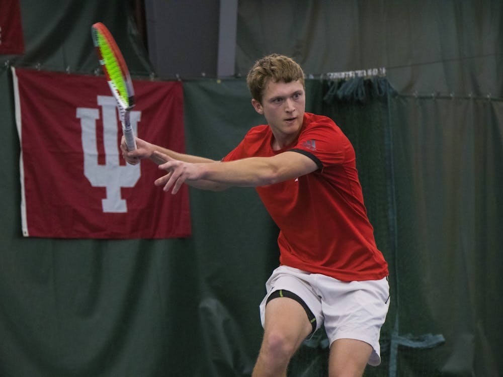 IU tennis junior Carson Haskins watches the ball against the University of Notre Dame Feb. 1, 2020, at the IU Tennis Center. The Hoosiers went 1-1 over the weekend, losing 0-4 to the No. 24 ranked Michigan Wolverines on Saturday and beating the Michigan State Spartans 6-1 Sunday.