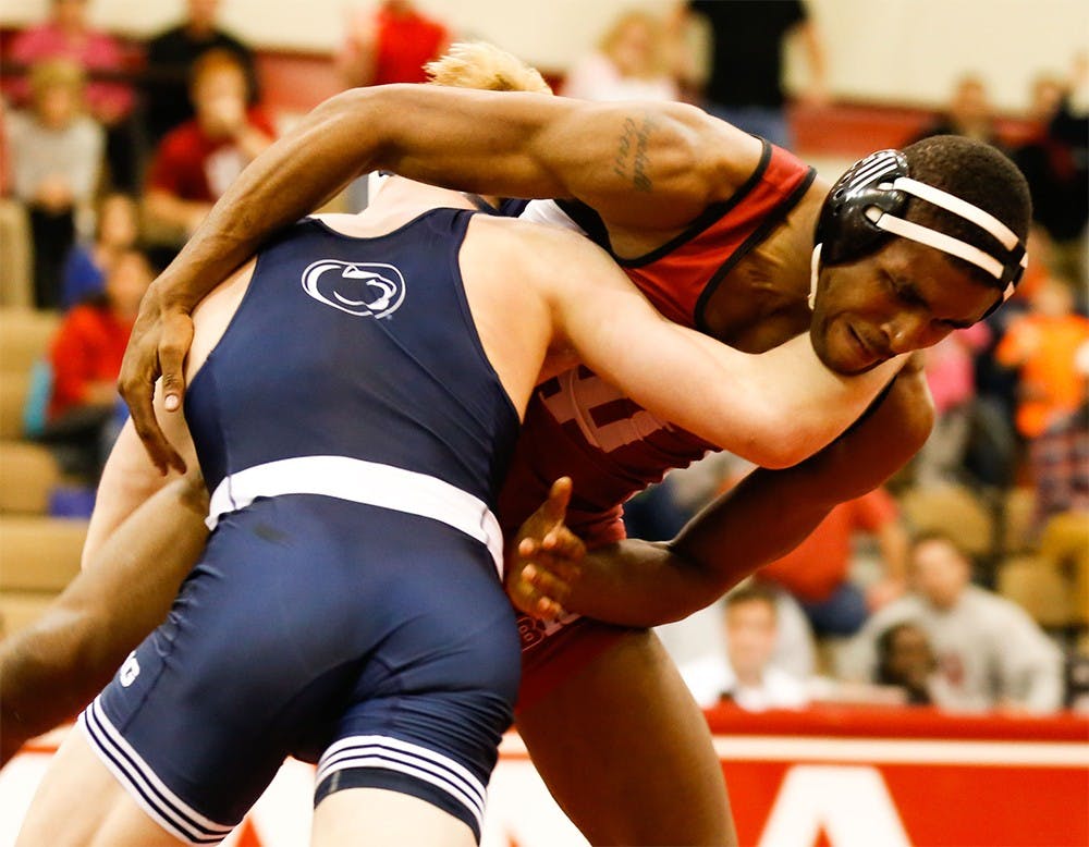 Nate Jackson, right, has a 174 lbs match with Bo Nickal from Penn State Sunday at University Gym. Jackson defeated the top national ranker. 