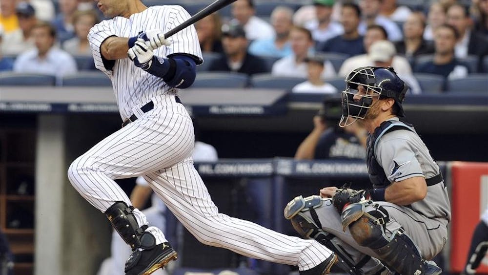 Derek Jeter of the New York Yankees strokes a double in the first inning against the Tampa Bay Rays on Thursday at Yankee Stadium in New York. Jeter hit his 3,000th career home run against the Rays on Saturday.