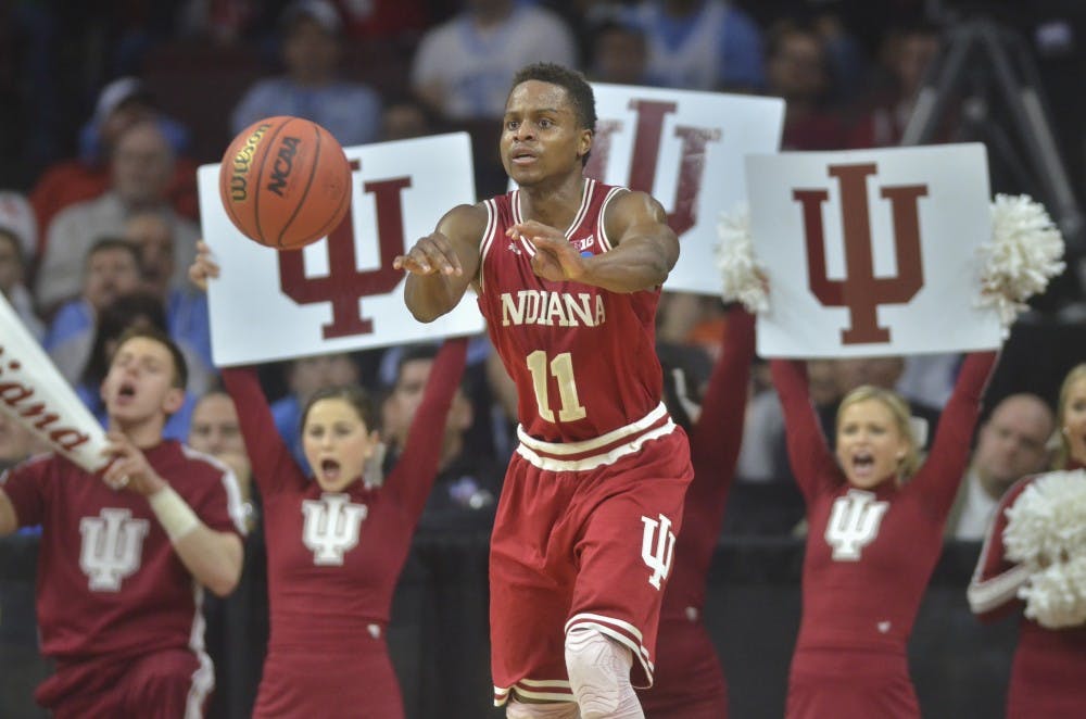 Senior guard Yogi Ferrell passes the ball on Friday at the Wells Fargo Center. Indiana lost to North Carolina 101-86.