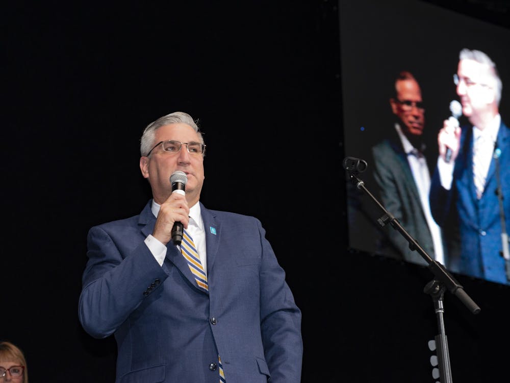 Indiana Gov. Eric Holcomb speaks at the 2018 State GOP Convention. Indiana State Police Superintendent Doug Carter said that law enforcement should not pull people over for violating the stay-at-home order during  Gov. Holcomb&#x27;s press briefing.