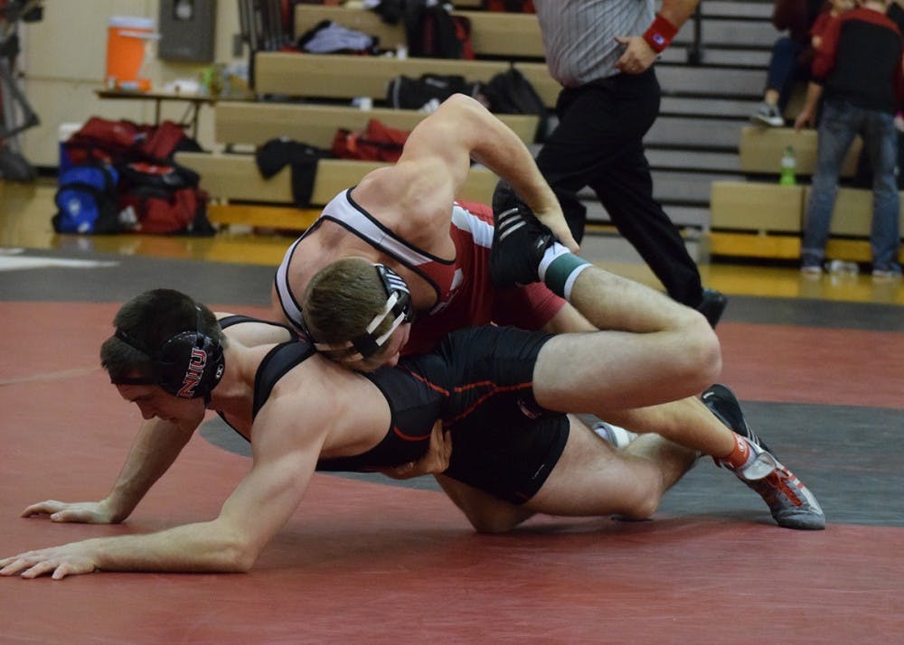 <p>Then-sophomore, now junior Norman Conley defeats Northern Illinois junior Bryce Gorman during the first session of the 2017 Hoosier Duals. IU wrestling begins its 2018-19 season this weekend.</p>