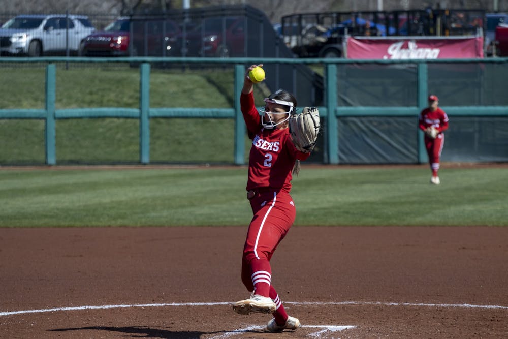 <p>Junior Macy Montgomery prepares to pitch the ball March 6, 2023, at Andy Mohr Field. Indiana softball extended its winning streak to 12 over the weekend.</p>