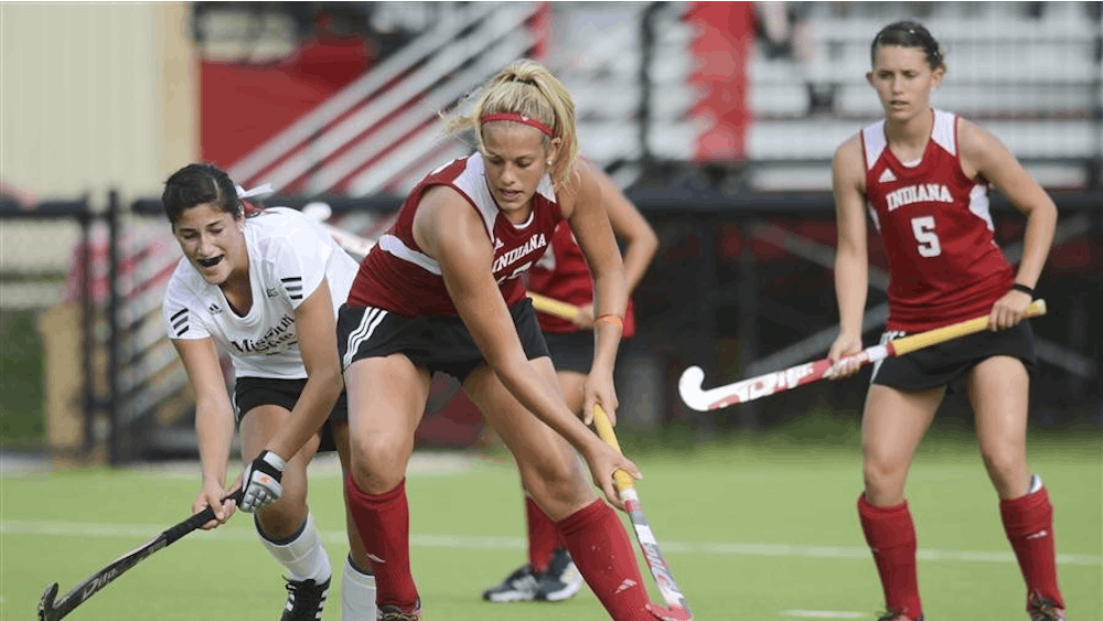 Junior defender Hannah Boyer fights for the ball during the Hoosiers' 5-1 win against Missouri State on Friday at the IU Field Hockey Complex.