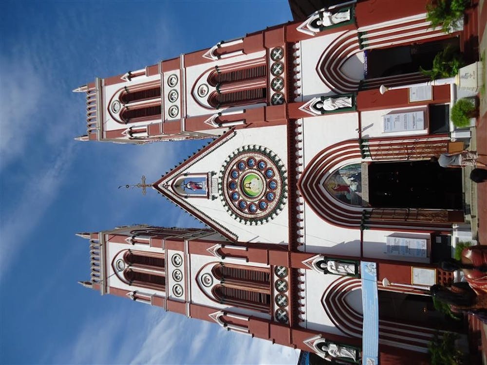 Colorful depictions of Jesus decorate the outside of Sacred Heart Basilica in Pondicherry, India.