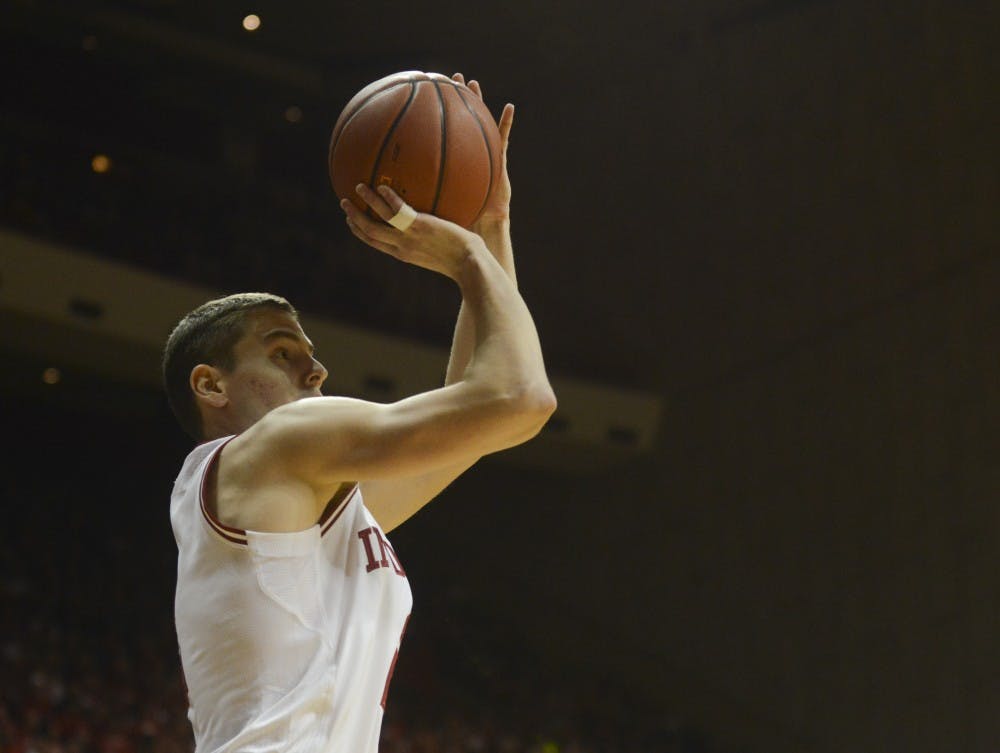 Redshirt senior Nick Zeisloft shoots a three during the game agaisnt McNeese State on Satuday at Assembly Hall. The Hoosiers won, 105-60.