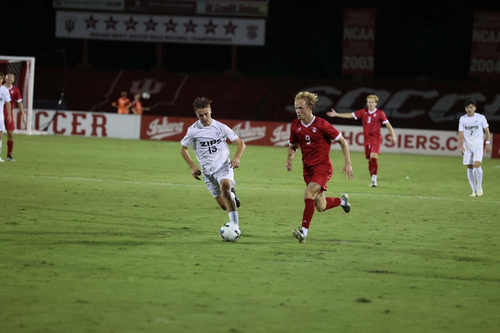 <p>Sophomore forward Samuel Sarver brings the ball down the field against the University of Akron on Sept. 9, 2022, at Bill Armstrong Stadium. Sarver was one of the two goal scorers in the game.</p>
