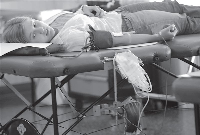 IU student Joan Russick donates blood at Teter Quad during a blood drive Sept. 14, 2006.