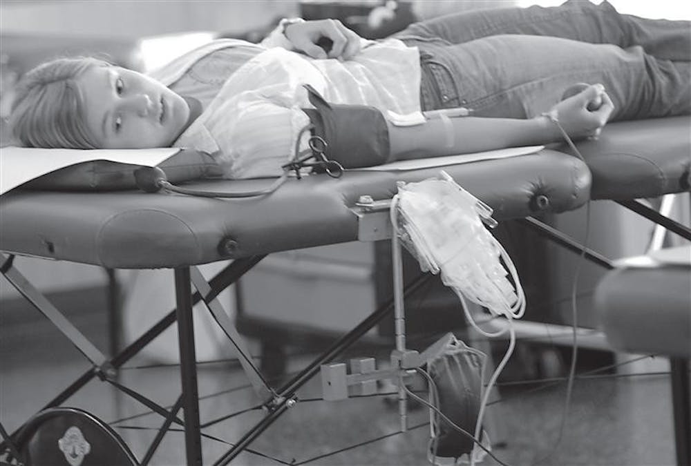 IU student Joan Russick donates blood at Teter Quad during a blood drive Sept. 14, 2006.