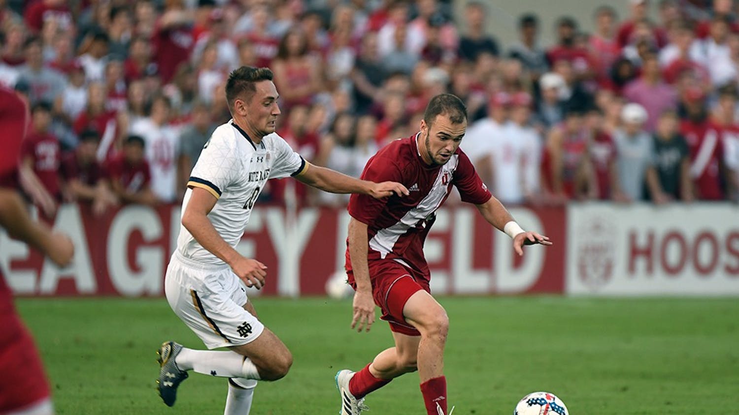 Then-junior, now senior defender Andrew Gutman dribbles the ball against Notre Dame on Sept. 26, 2017 at Bill Armstrong Stadium. No. 4 IU will travel to South Bend Tuesday night to take on No. 12 Notre Dame.&nbsp;