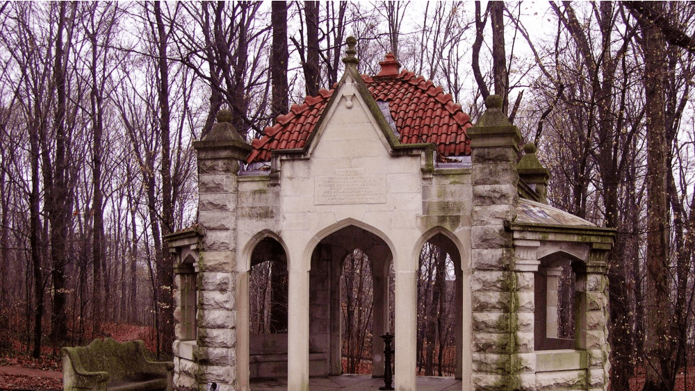 The Rose Well House is a small structure built in 1908 from stone door gates that were originally part of the Old College Building. The well house is located on the northeastern edge of Dunn's Woods.