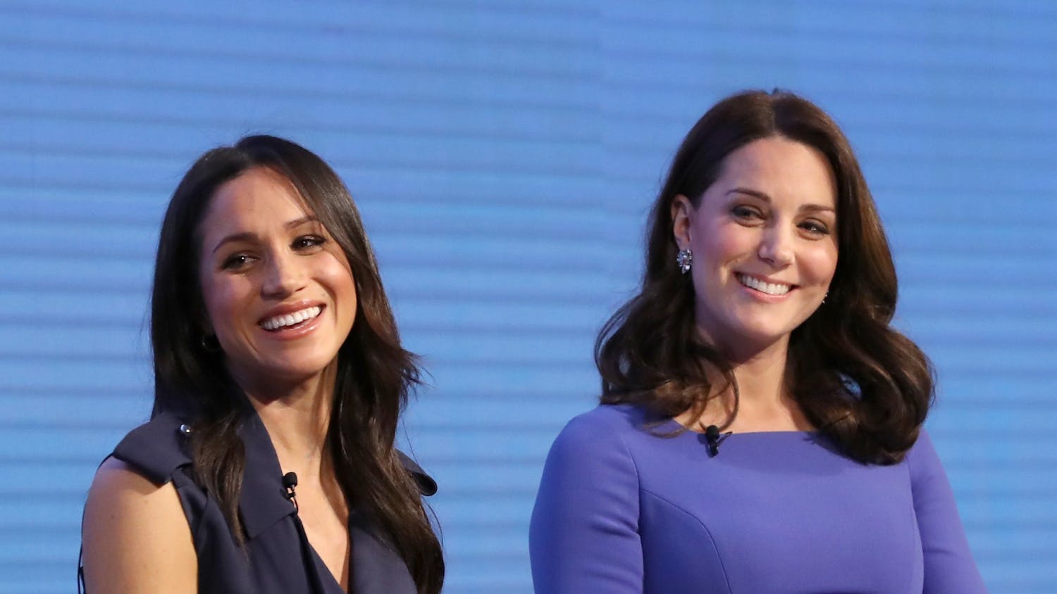 Meghan Markle, left, and Catherine, Duchess of Cambridge, attend the first Royal Foundation Forum on Feb. 28, 2018, in London.