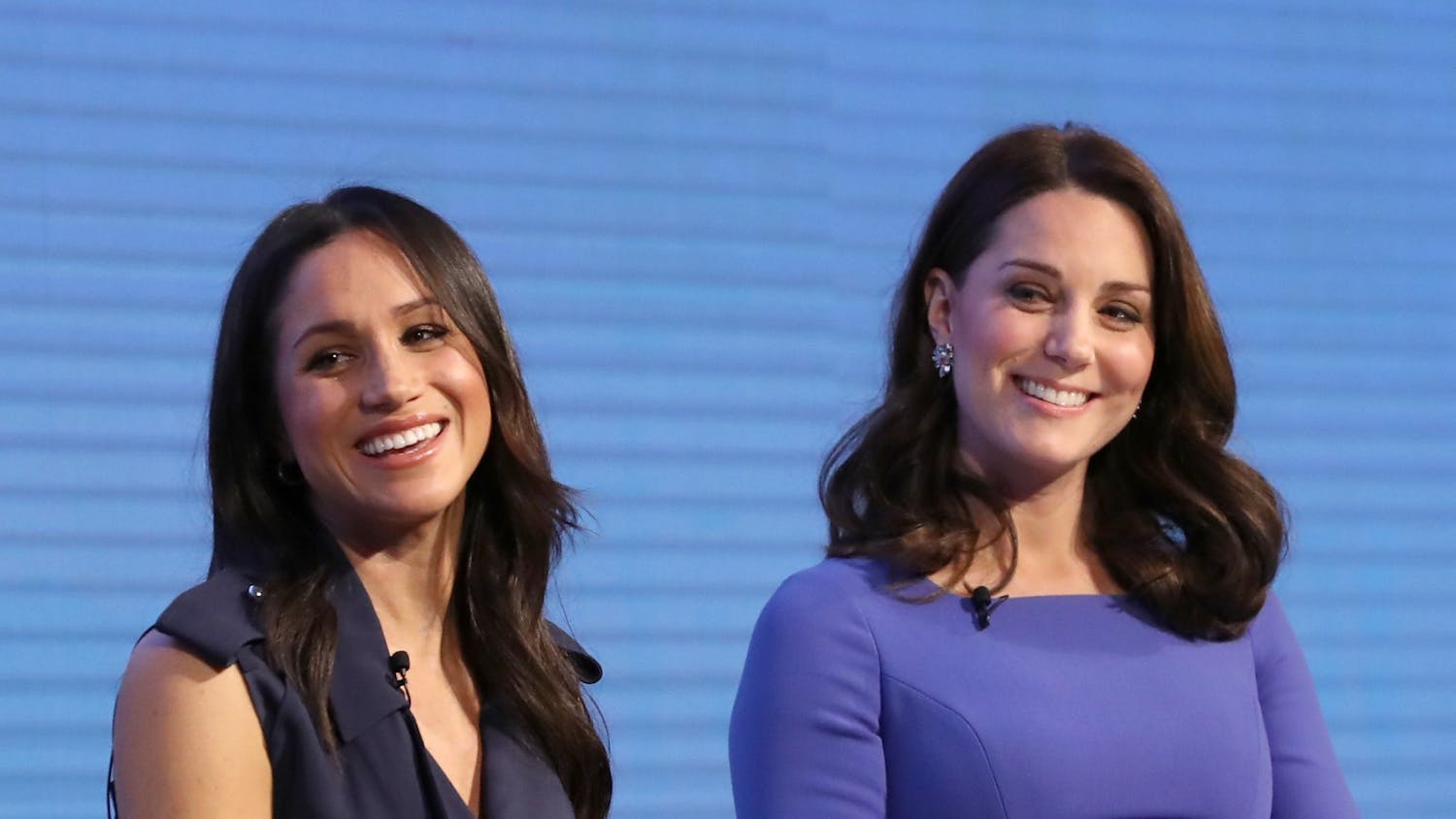 Meghan Markle, left, and Catherine, Duchess of Cambridge, attend the first Royal Foundation Forum on Feb. 28, 2018, in London.