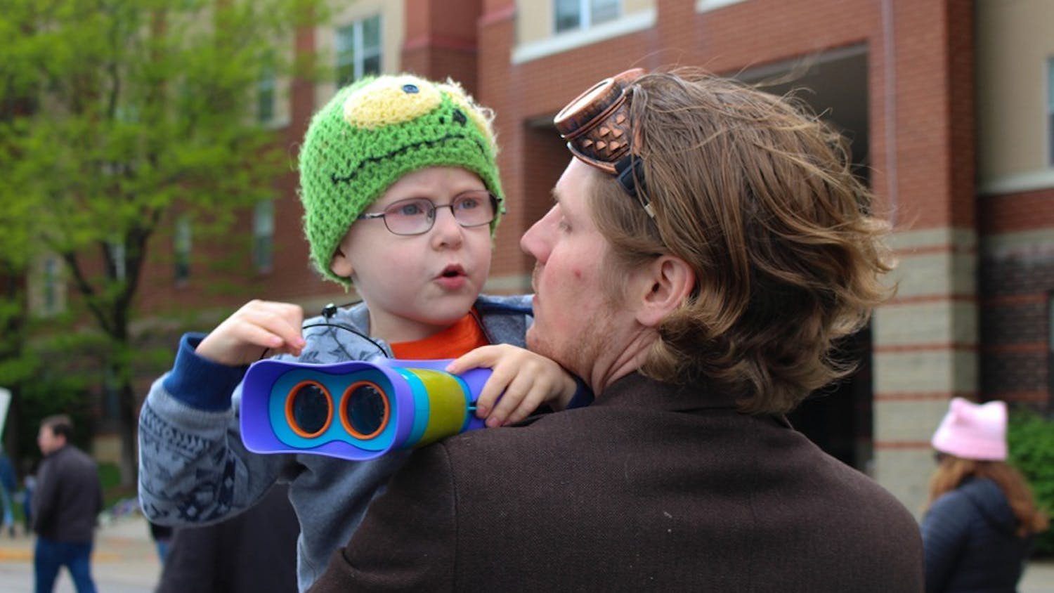 Theodore Williamson, 4, checks out the crowd of science lovers around him. The Williamson family attended the Indianapolis March for Science on Saturday.