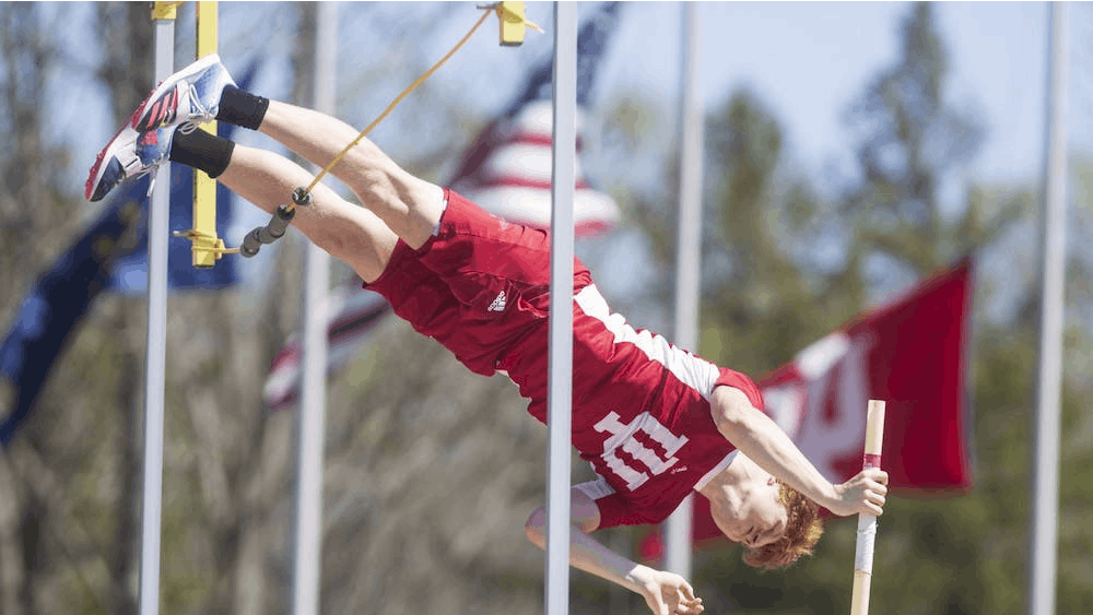 Then-junior pole vaulter Nathan Stone flies over the bar April 23, 2022, at the Robert C. Haugh Complex. Indiana track and field hosted the Indiana Invitational over the weekend.