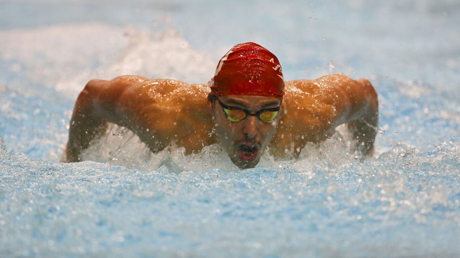 Junior swimmer Vini Lanza competes in the men's 200m butterfly heat during IU's meet against Louisville last season. Lanza is a part of the IU men's swimming and diving team that has gotten off to a 6-0 start this season.