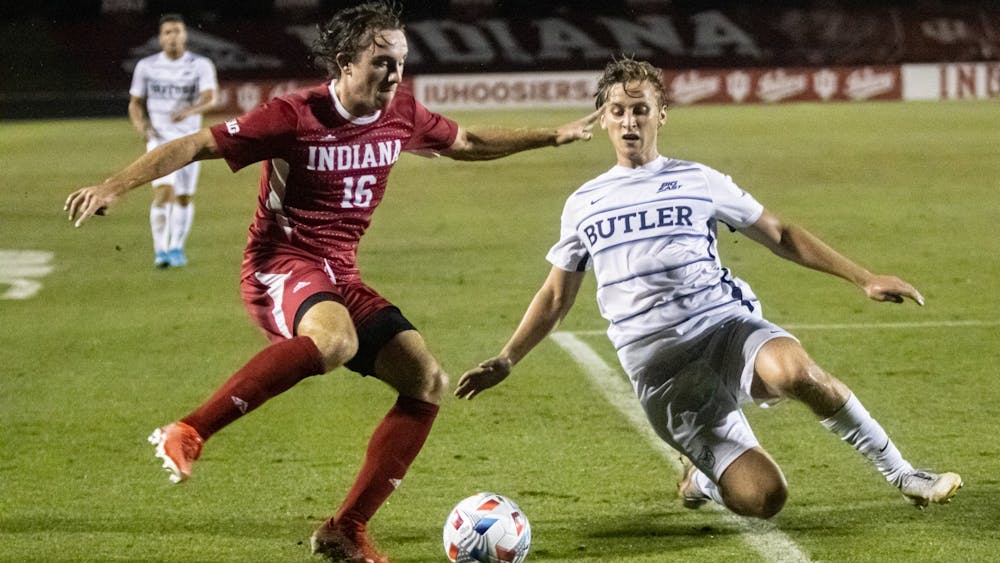 Sophomore defender Lukas Hummel attempts to dribble past a Butler University player during IU men&#x27;s soccer&#x27;s home opener on Aug. 31, 2021, at Bill Armstrong Stadium. Indiana will play Rutgers at 8 p.m. on Sept. 17, 2021, in Bloomington. 