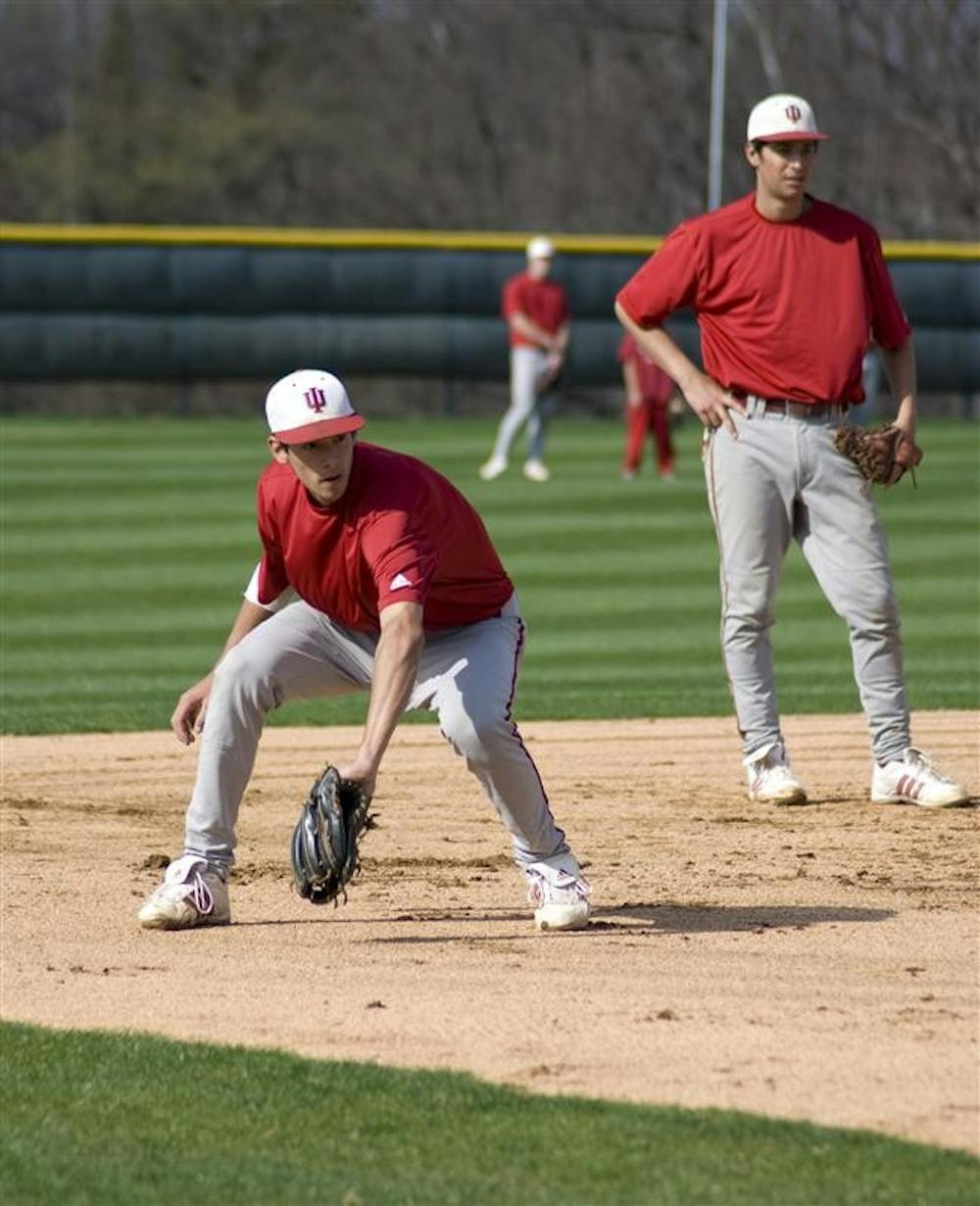 Shortstop Jake Dunning fields a ground ball at practice March 26 at Sembower Field. The baseball team will play Louisville at 4 p.m. today on the road.