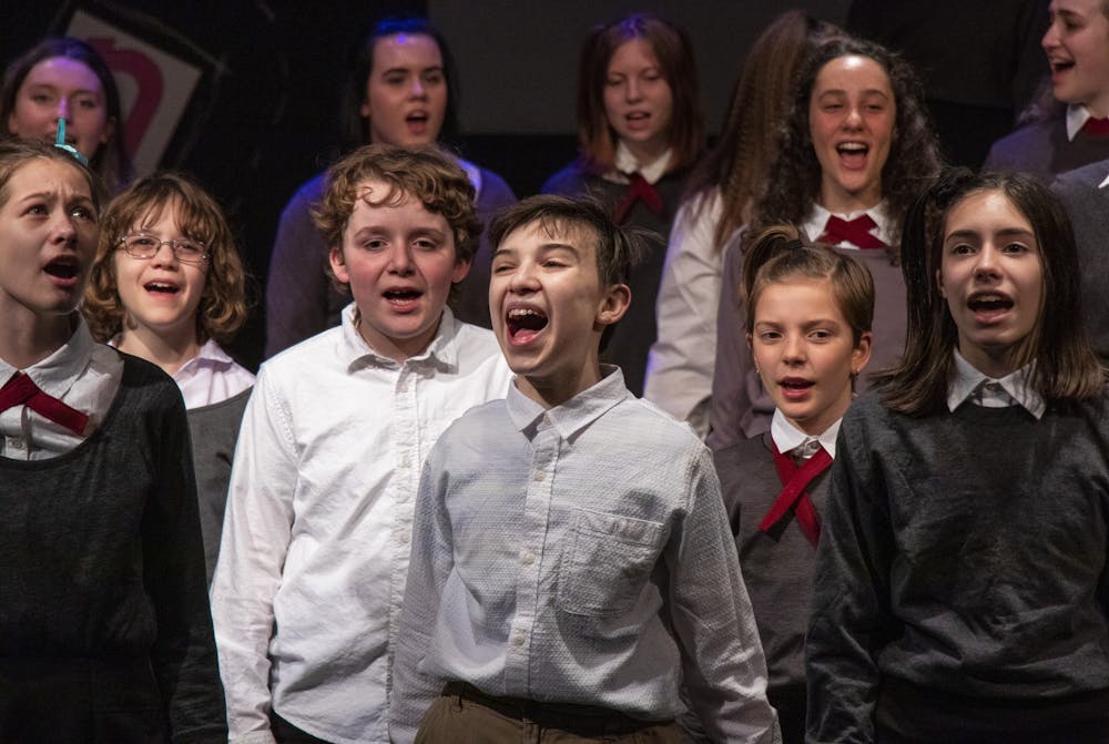 <p>The cast of &quot;Matilda the Musical&quot; rehearses the song “When I Grow Up” on March 2 in Whikehart Auditorium in the John Waldron Arts Center. Stages Bloomington, a theater company, will perform the musical March 5 to 8 in Whikehart Auditorium.</p>