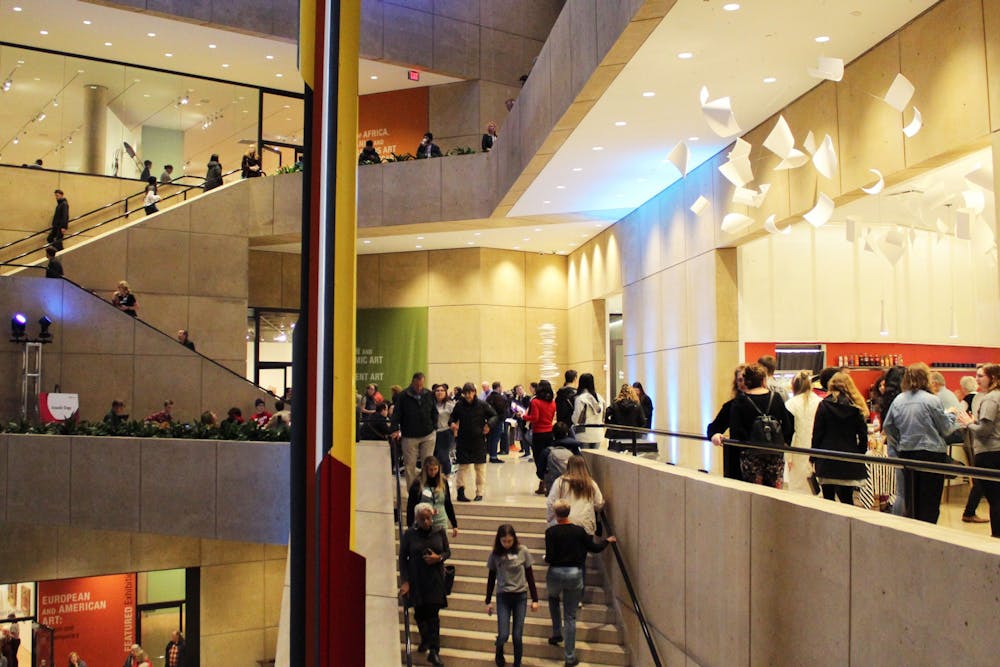 <p>Visitors explore the exhibits and newly renovated space Nov. 7, 2019, in the Eskenazi Museum of Art. The museum has been closed since May 2017.</p>