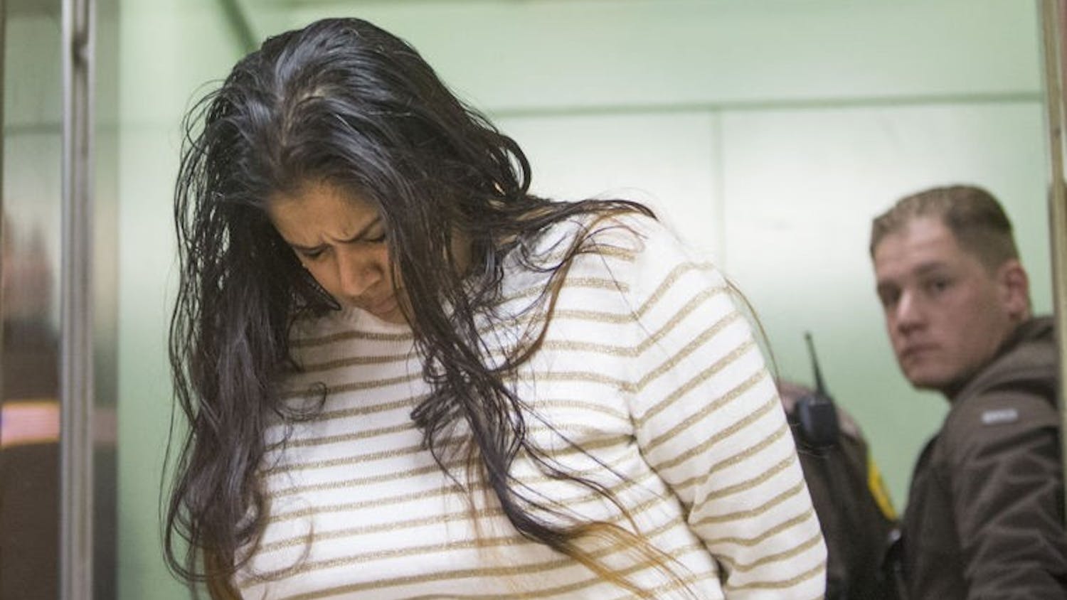 Purvi Patel is taken into custody after being sentenced to 20 years in prison for feticide and neglect of a dependent on March 30 at the St. Joseph County Courthouse in South Bend. 