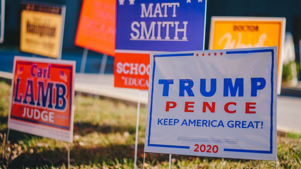 Signs show the names of candidates Nov. 3, 2020, outside Faith Lutheran Church. HOPE is an Indiana voter outreach program with a goal of increasing voter registration for upcoming elections. 