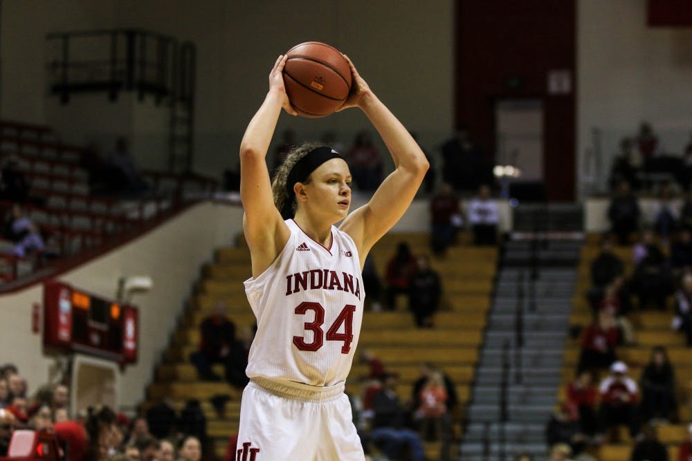 <p>Freshman guard Grace Berger looks for a teammate to throw the ball to. IU is 4-0 for the first time since the 2014-15 season.</p>